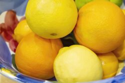 Large bowl of lemons and oranges in a kitchen