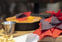 Mexican Chicken Chili Appetizer in a Cast Iron Skillet and Chips