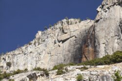 Granite formations and drying water fall in Yosemite Valley, California