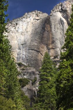 Granite formations and drying water fall in Yosemite Valley, California