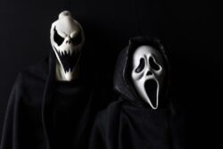 Scary Halloween ghouls with scary faces on a black background
