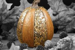 Lovely decorative pumpkin placed as a table center for Thanksgiving