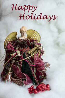 Christmas angel set in snow and clouds